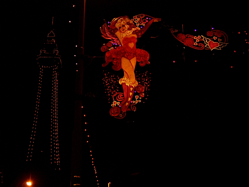 Photo - Cupide illuminated with Blackpool Tower lit up in the background - Erection and Switch-On - Making of a Blackpool Illumination - © Sarah Myerscough